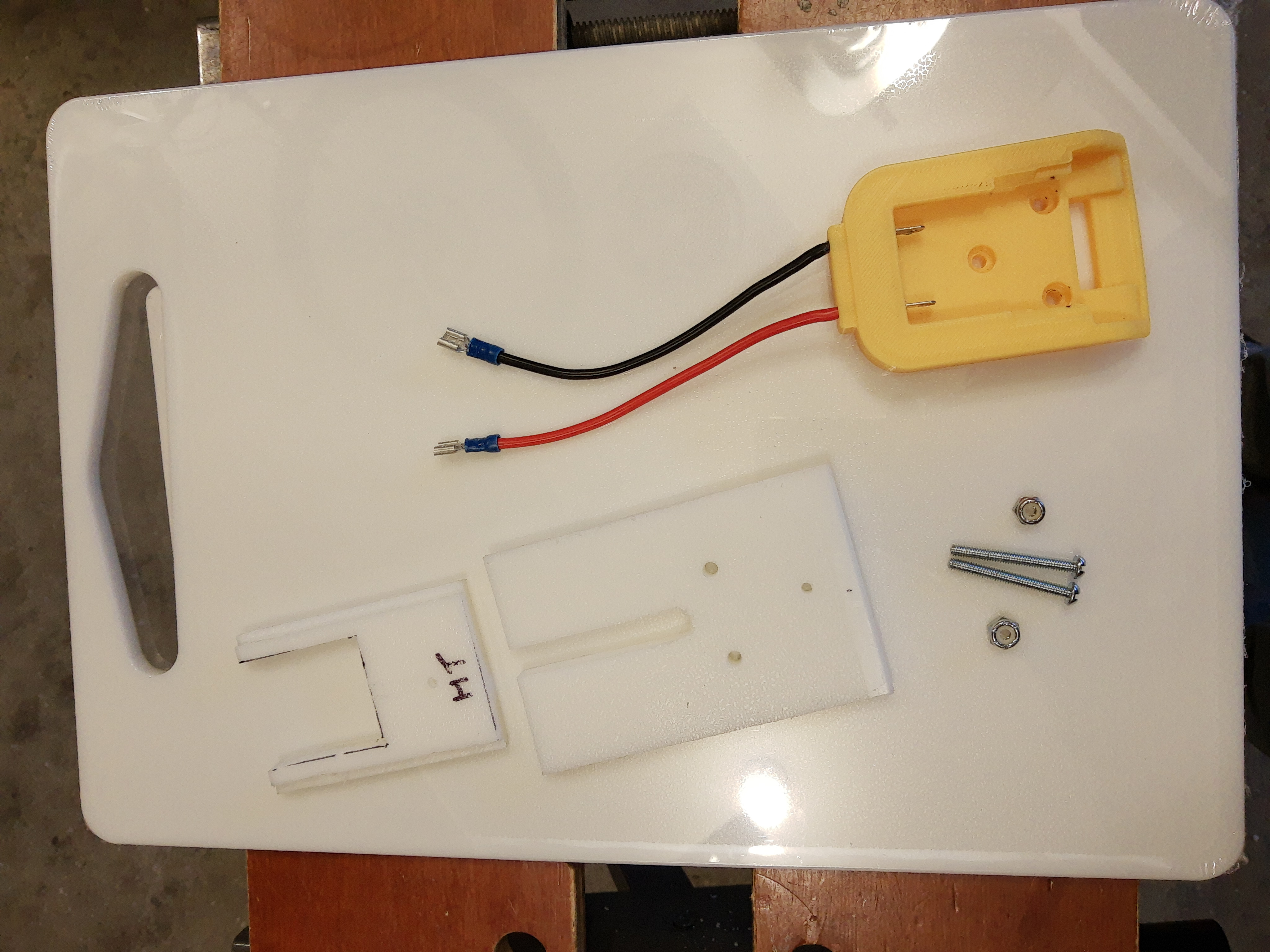 Cutting board, cutting board pieces, battery connector, screws and nuts
