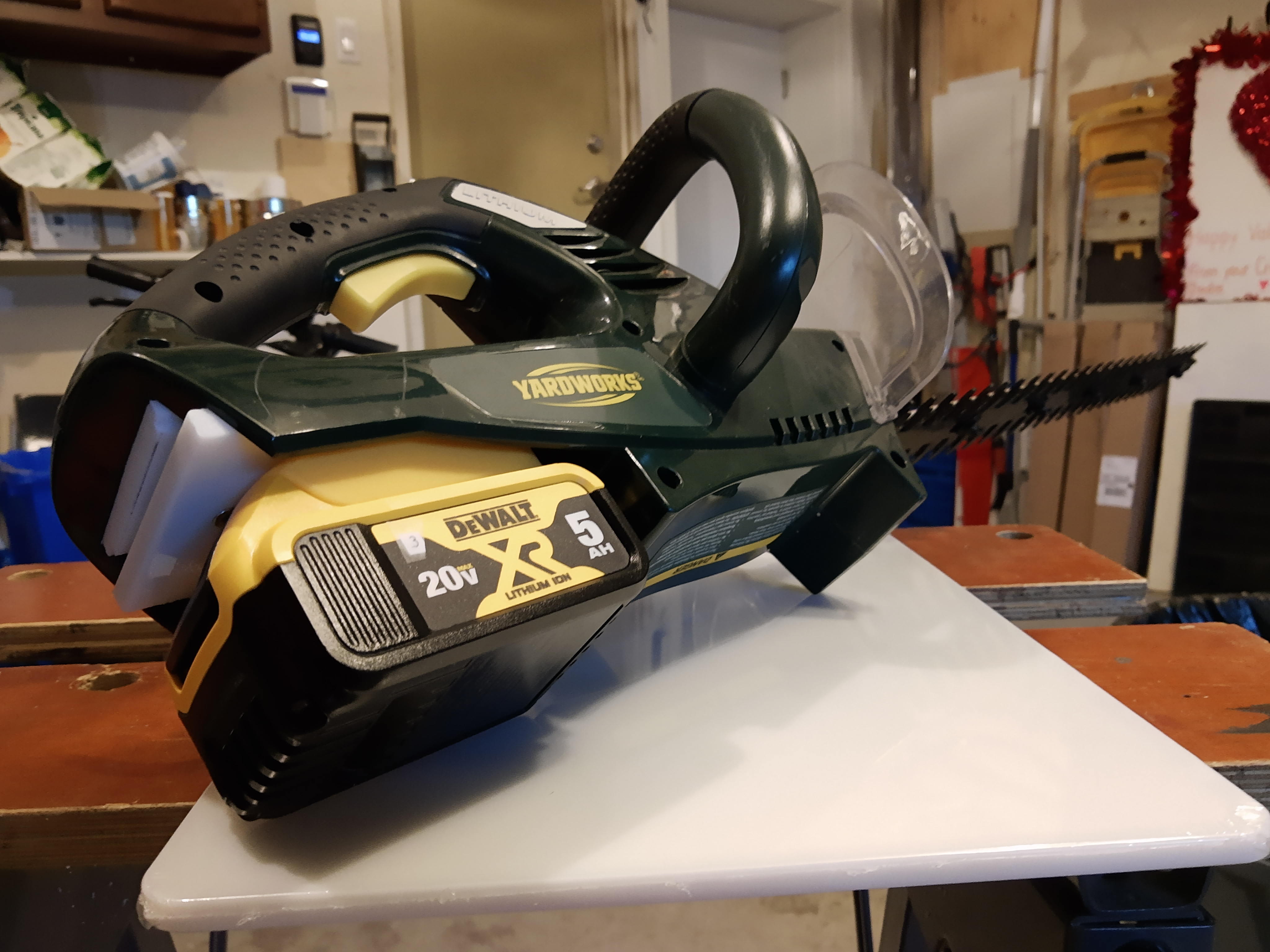 Partial assembly of parts on hedge trimmer